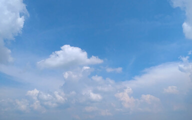 Sunshine clouds sky during morning background. Blue, white pastel heaven, soft focus lens flare sunlight. Abstract blurred cyan gradient of peaceful nature. Open view out windows beautiful summer