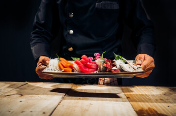Sashimi Japanese food, Sashimi set. Salmon, wasabi, fish, shrimp,octopus, sashimi, hirame, salmon sashimi and tuna sashimi, Japanese food concept, with copy space. Dark Tone