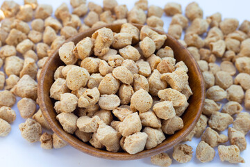 Textured soy protein on white background.