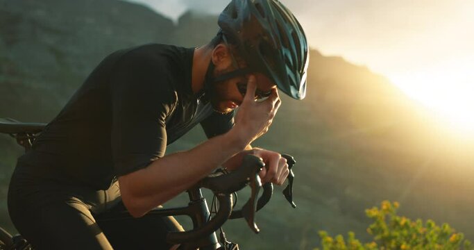 Tired, headache and mountain bicycle man in nature outdoor adventure, fitness challenge or training for marathon. Tired, fatigue or sad cyclist in bike gear in sun for travel fail, pain or problem