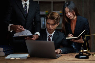Group of Lawyer working and discussing in office workplace for consultant lawyer concept. Law, legal services, advice, Justice concept