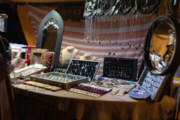 Stall in the bazaar for the sale of jewelry. A large assortment of jewelry and expensive jewelry.