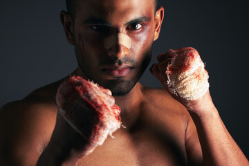 Man, face and blood fist fight with first aid bandages for fighting injury after boxing match. Angry mma athlete boxer, strong bloody hands and fight stand for sports competition in dark background - obrazy, fototapety, plakaty