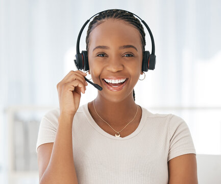 Call center, telemarketing and black woman in customer service office with headset, smile and happiness. Face of female contact us, CRM and sales consultant with a smile for to talk, support and help