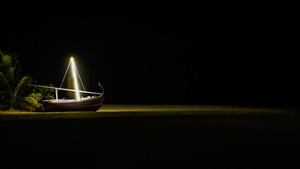 sailboat at night