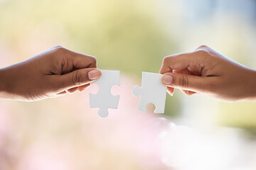 Puzzle, hands and businesspeople connected for company merger and support. Partner, collaborate and...