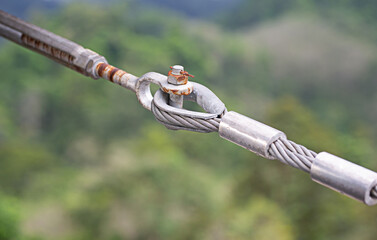 Close-up photo of the connection point of a large wire rope.