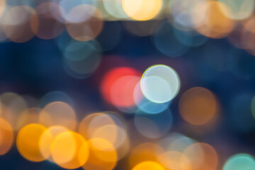 Abstract city lights blur blinking background. Soft focus horizontal long banner. Bokeh sparkles...