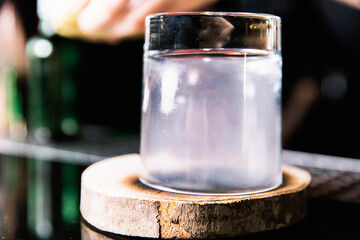 beautifully decorated cocktail in a nightclub, people drink a drink