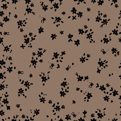 Cute floral pattern in a small flower. Seamless vector texture. An elegant template for fashionable prints. Print with small black  flowers and leaves. beige  background.