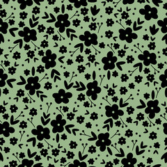 Cute floral pattern in a small flower. Seamless vector texture. An elegant template for fashionable prints. Print with black  flowers and leaves. light green background.