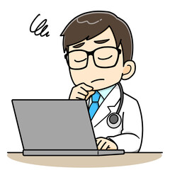 パソコンの前で困り悩む男性医師