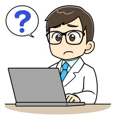 パソコンの前で疑問に思う白衣の男性