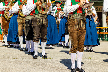 Musical band with the traditional costumes of Val Gardena