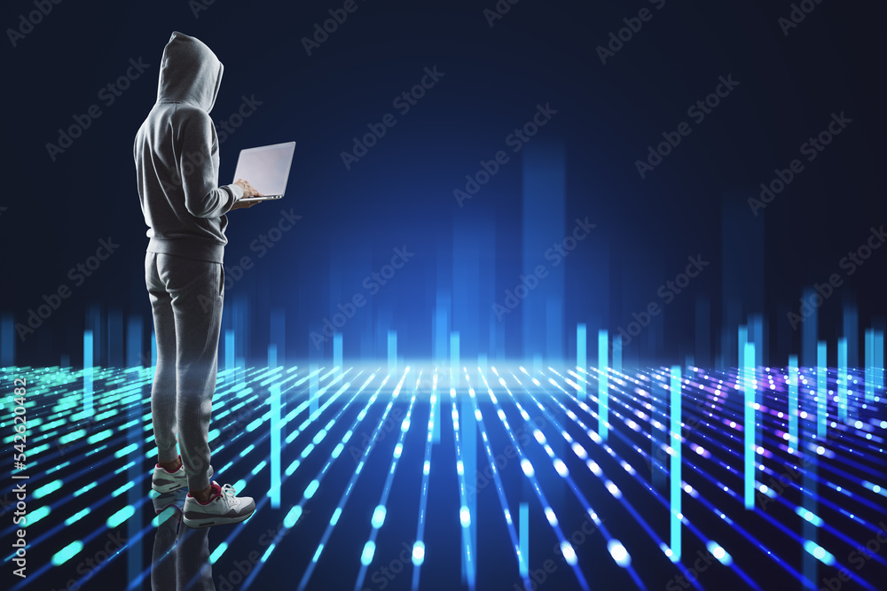 Aufkleber Hacker with laptop computer standing on creative blue metaverse background. Digital future, data hacking and cyberpunk concept.