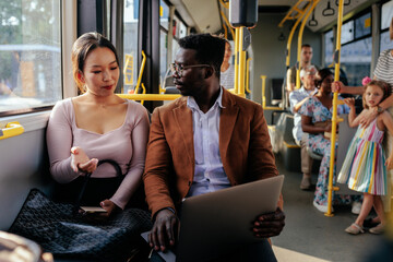 Young couple on a city bus