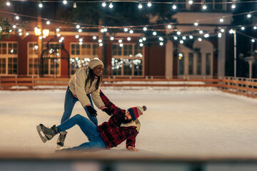 Couple in winter ice skating