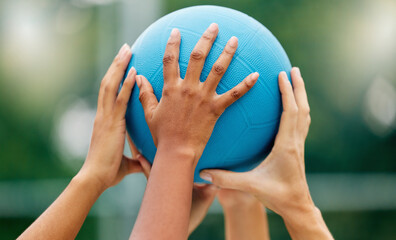 Netball, hands and woman holding a ball during a game for support, teamwork or training together. Sports, community and collaboration for a team of athlete people at a sport event with solidarity