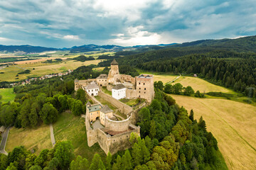View of Slovakia with Tatras moutain and Stara Lubovna castle. Preserved castle in the Spiš region