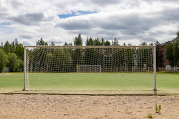 Fototapeta premium Football goal at the city stadium.