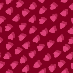 Simple pink hearts seamless pattern chaotic red background made of tiny heart silhouettes of overlapping layering effect.For Valentines,mothers day,Easter,wedding,gift wrapping paper,textiles