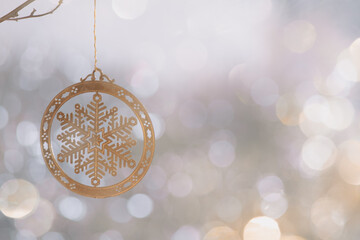 Golden snow flake Christmas tree decoration