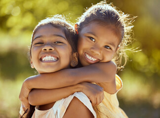 Girl, hug and love, sisters and happy in portrait together, young kids outdoor and family bonding...
