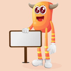 Cute orange monster standing next to a billboard