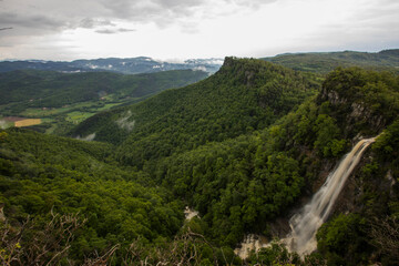 Spring sunset in Salt De Coromina waterfall, La Garrotxa, Spain