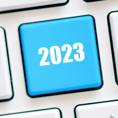 2023 year on the blue key of the computer keyboard.