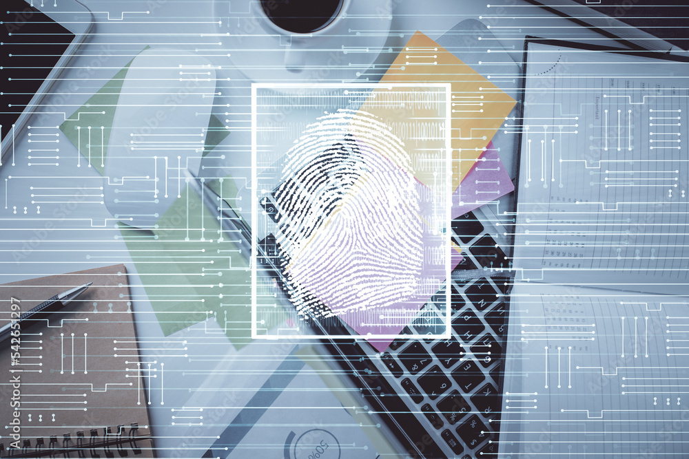 Poster Finger print over computer on the desktop background. Top view. Double exposure. Concept of securitization.