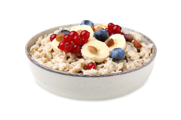 Ceramic bowl with oatmeal, berries and banana slices isolated on white