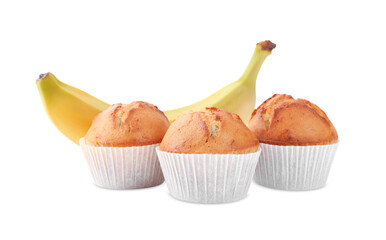 Tasty muffins and ripe banana on white background