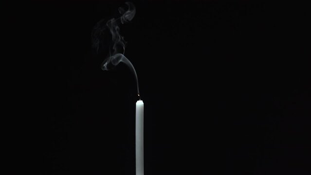 arm a candle in baground dark