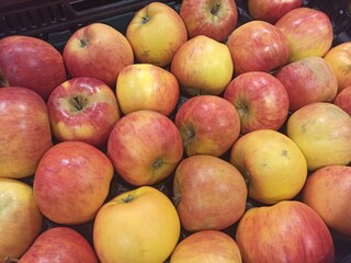 Textured background of several apples