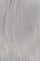 Texture of gray, silvery hair. Top view.