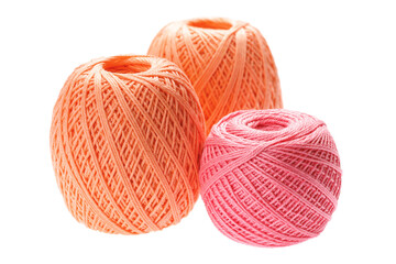 Three skeins of thread for machine knitting. Isolated on white background. Side view. Selective...