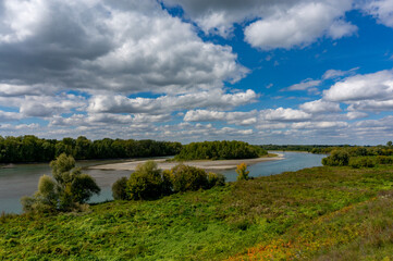 Fototapeta na wymiar landscape of the Katun River floodplain on a sunny day with light clouds in the sky. Altay, Russia