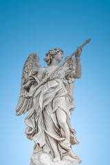 Cover page with statue of a beautiful holy angel with wings holding a war spear at the Saint Angel...