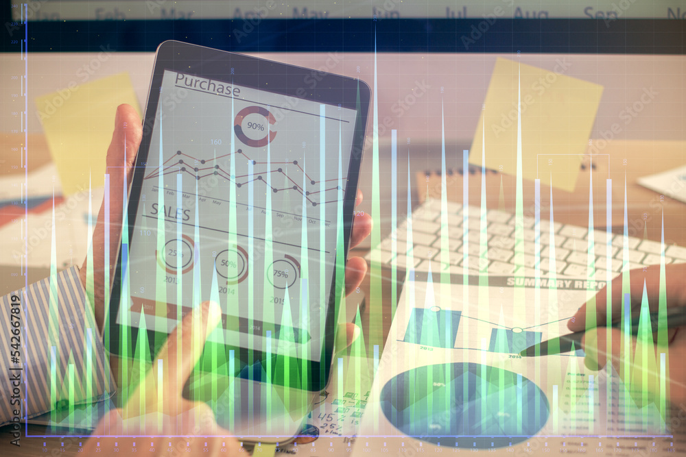 Poster multi exposure of man's hands holding and using a phone and financial chart drawing. market analysis