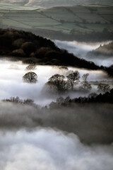 Misty countryside valley