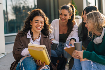 Group of friends studying together at university campus