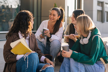 group of female college students outdoor in campus talking