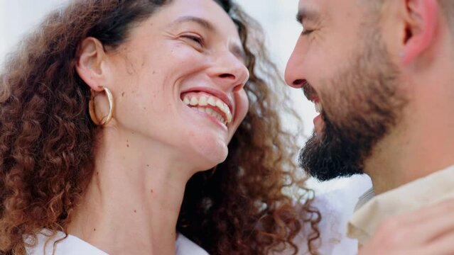 Love, couple and care with a couple smile, bonding and loving in her home with romance and affection. Marriage woman and happy man sharing an intimate and romantic moment together in their house