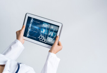 Close of female doctor hands working with tablet pc computer