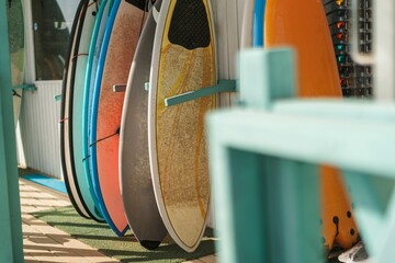 Beautiful shot of colorful wooden surfboards