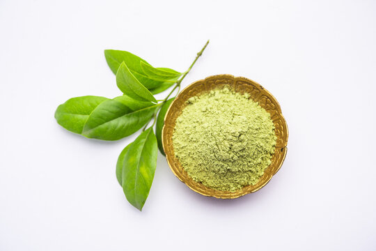 Herbal henna or Mehandi powder in a bowl forming heap, Used for Tattoo or Hair Dye in India