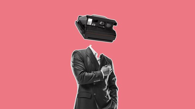Stylish business man with retro camera instead head over pink background. Stop motion animation. Business, finance, memories, fashion