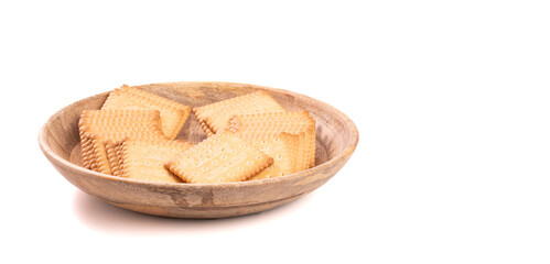 Crackers shot close-up with a macro lens on a white background, restaurant and food concept, copy space