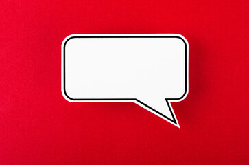 The Speech bubble with copy space communication talking speaking concepts on red background.